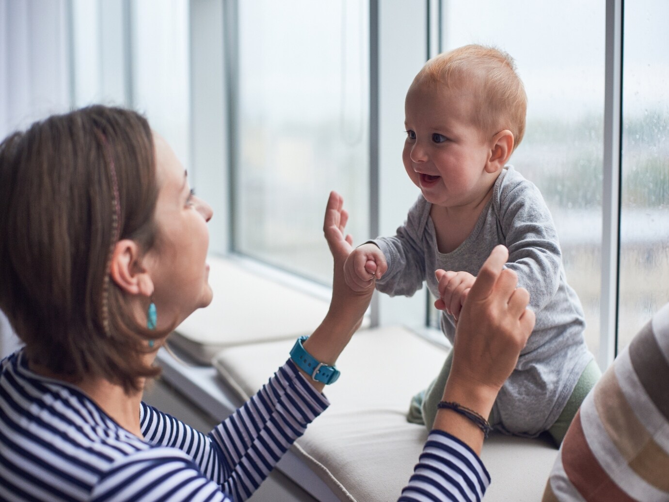 YORK Dehumidifier used in home for optimized humidity levels and comfort while mother and baby smile and play.
