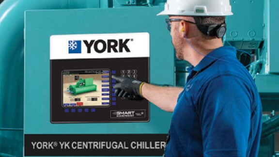 Tech person checking york machine