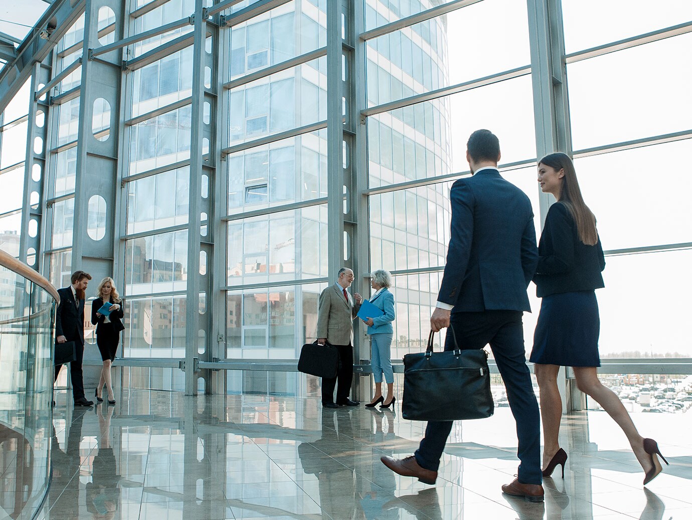 people walking in office building