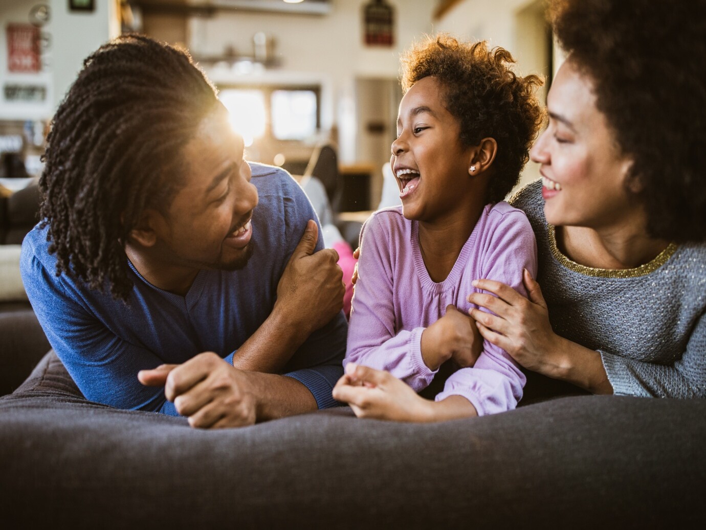 Young, happy family of three use a YORK Air Handler in home for maximum comfort and efficiency.
