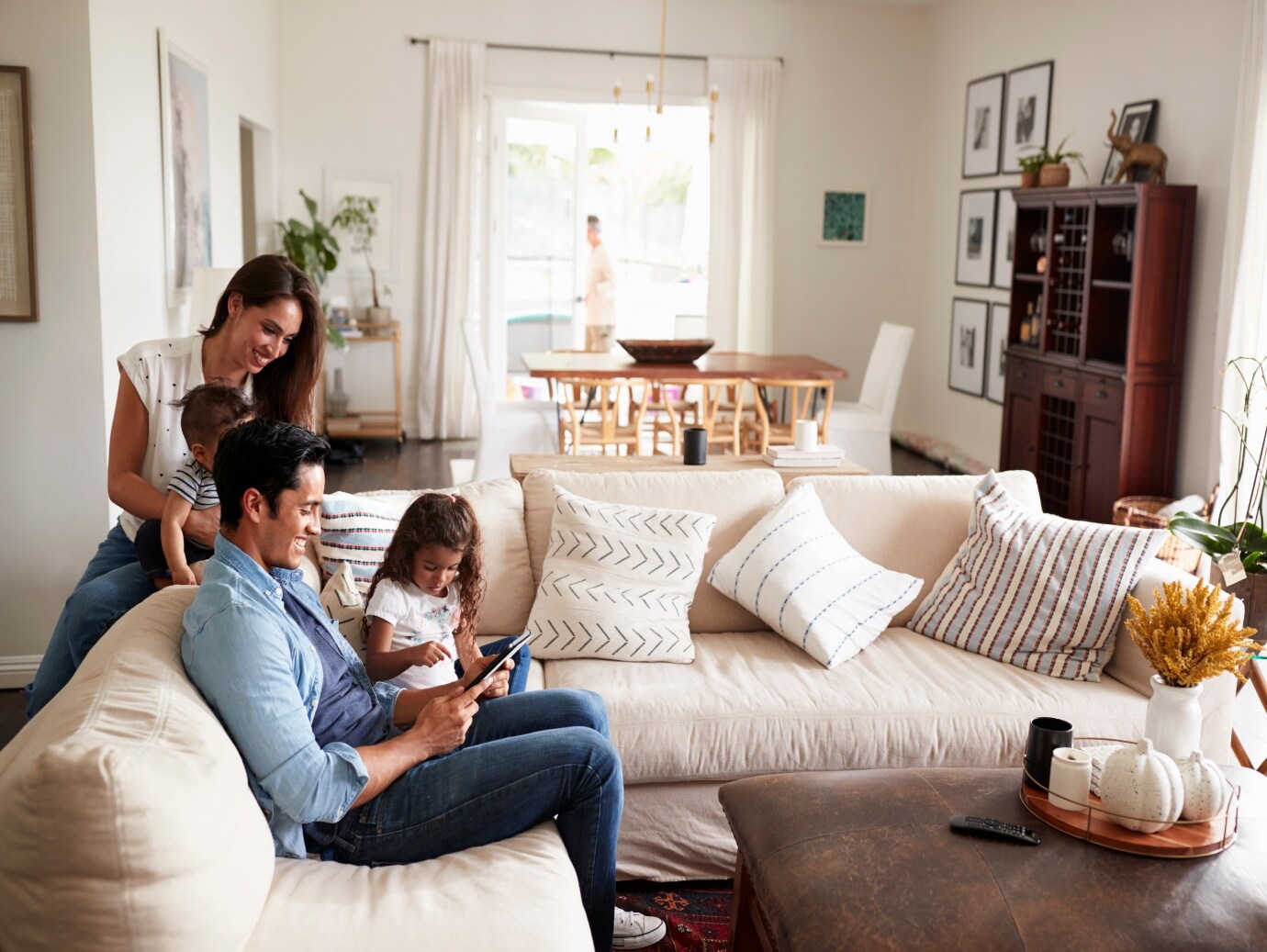 YORK Evaporator Coil used in the home of a happy family reading together on the couch.